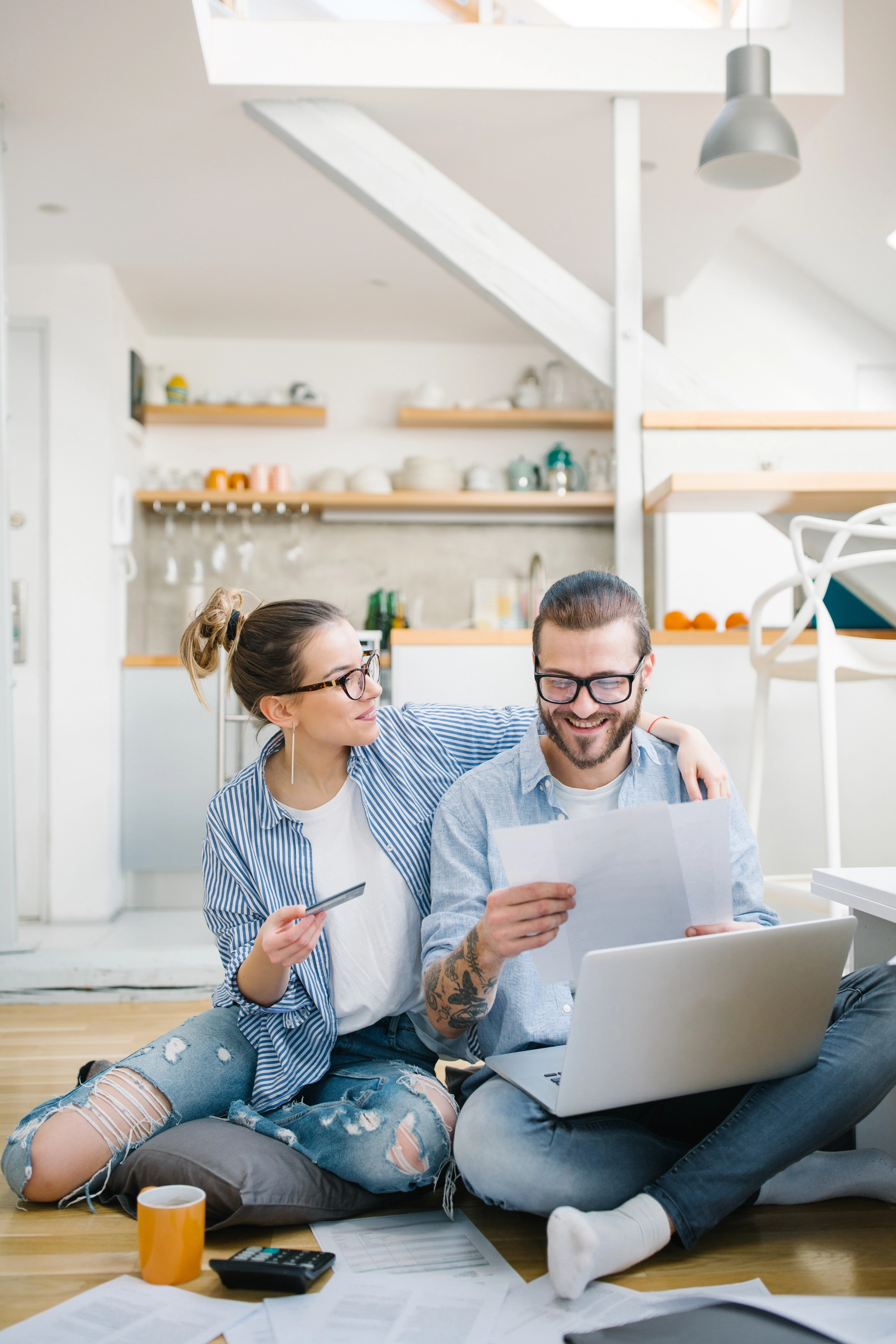 Photograph of a couple doing a budget.